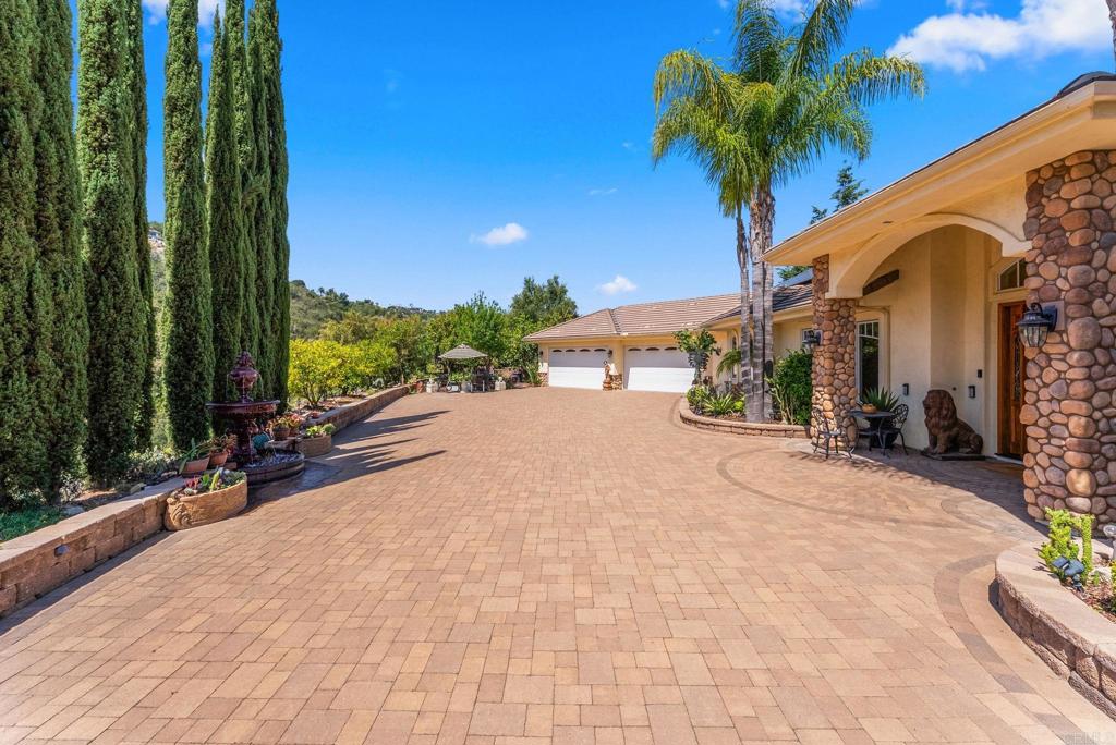 28820 Willow Park Road Escondido, CA 92026 - Photo 2 of 72 a view of a house with a yard and potted plants