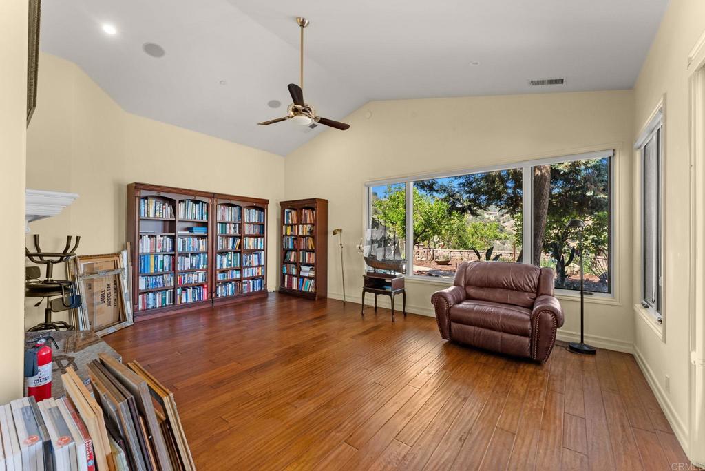 28820 Willow Park Road Escondido, CA 92026 - Photo 23 of 72 a living room with furniture and a wooden floor