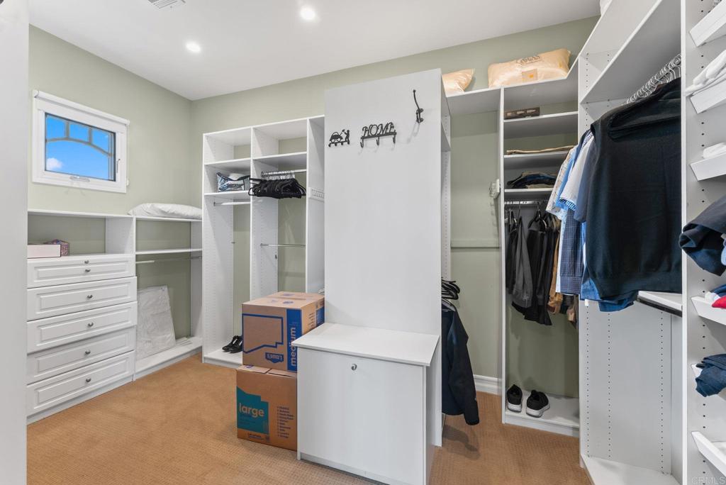 28820 Willow Park Road Escondido, CA 92026 - Photo 34 of 72 a view of walk in closet with clothes and shoes