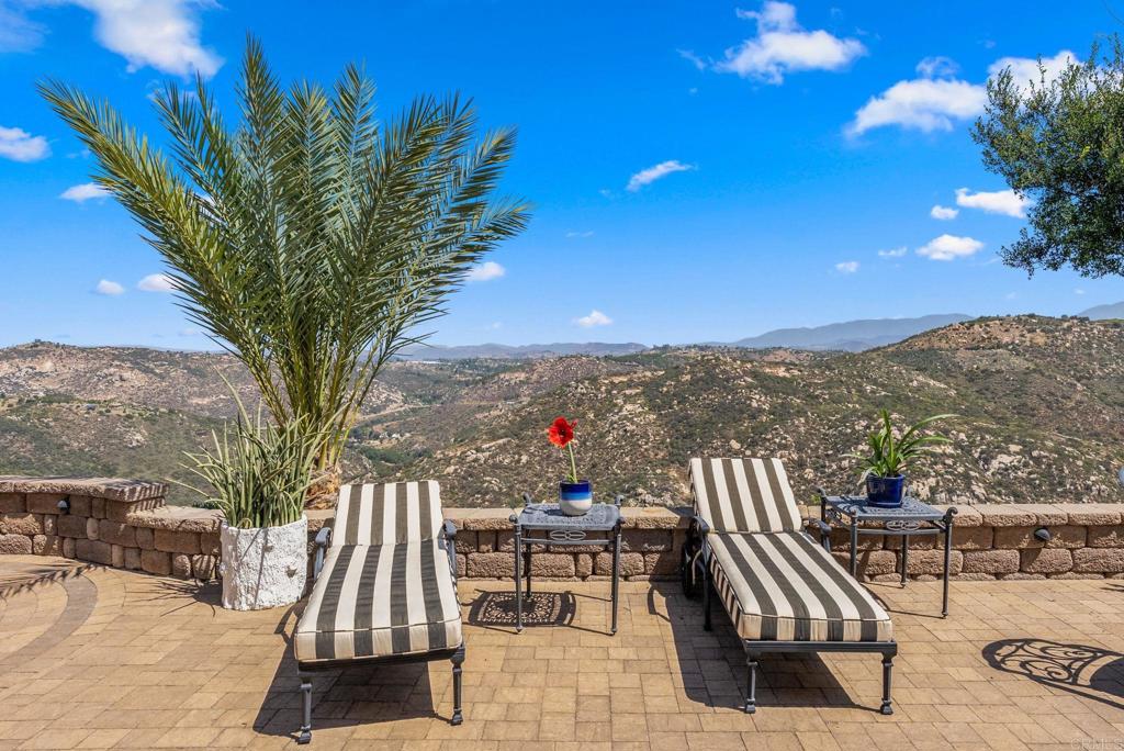 28820 Willow Park Road Escondido, CA 92026 - Photo 47 of 72 a view of a terrace with couches and wooden fence