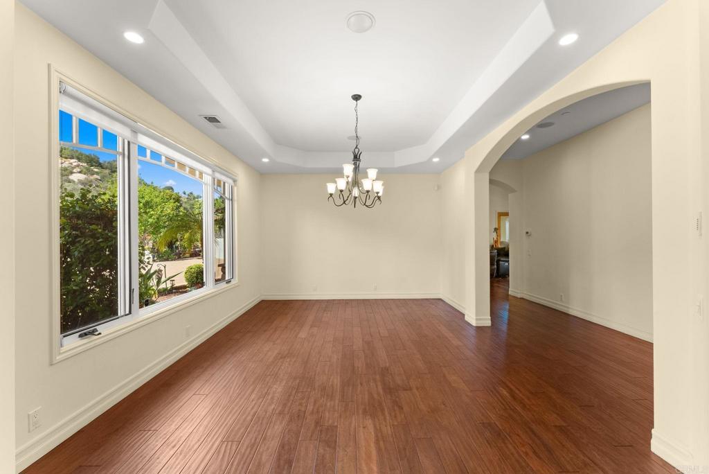 28820 Willow Park Road Escondido, CA 92026 - Photo 10 of 72 a view of an empty room with wooden floor and a window