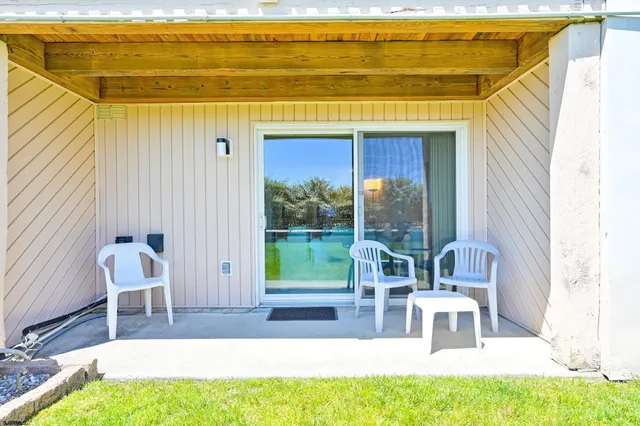 a house view with a outdoor seating space
