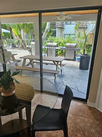 a room with furniture and a large window