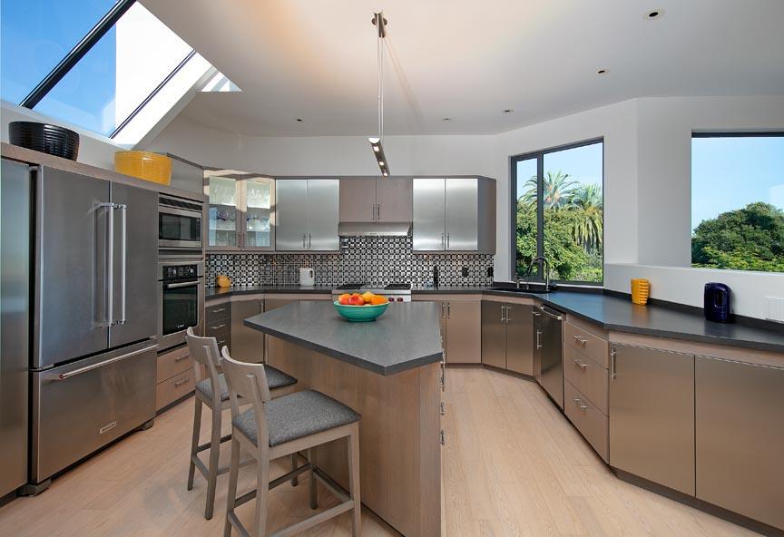5242 Austin Road Santa Barbara, CA 93111 - Photo 3 of 3 a kitchen with stainless steel appliances a sink a stove a refrigerator cabinets and a window
