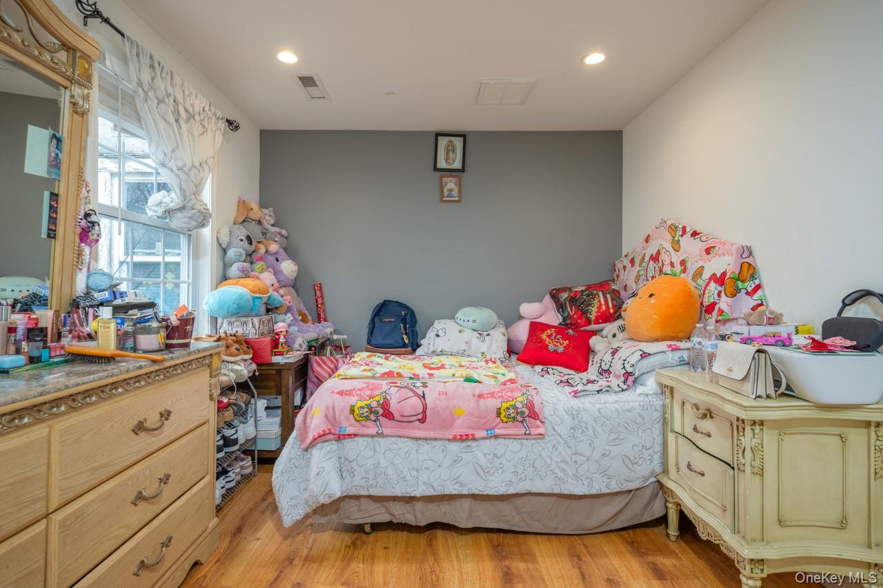 280 1st Street Newburgh, NY 12550 - Photo 17 of 24 a bedroom with bed and dresser