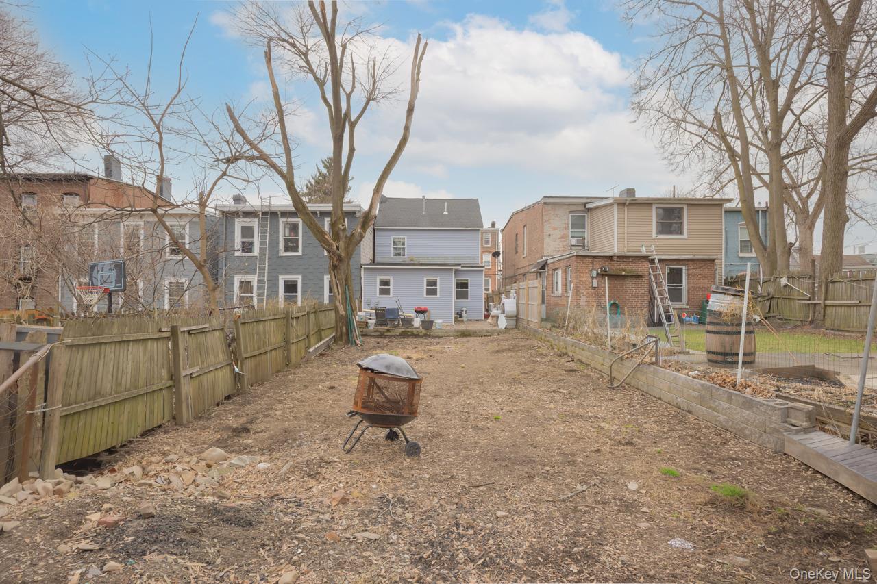280 1st Street Newburgh, NY 12550 - Photo 20 of 24 a front view of a house with backyard