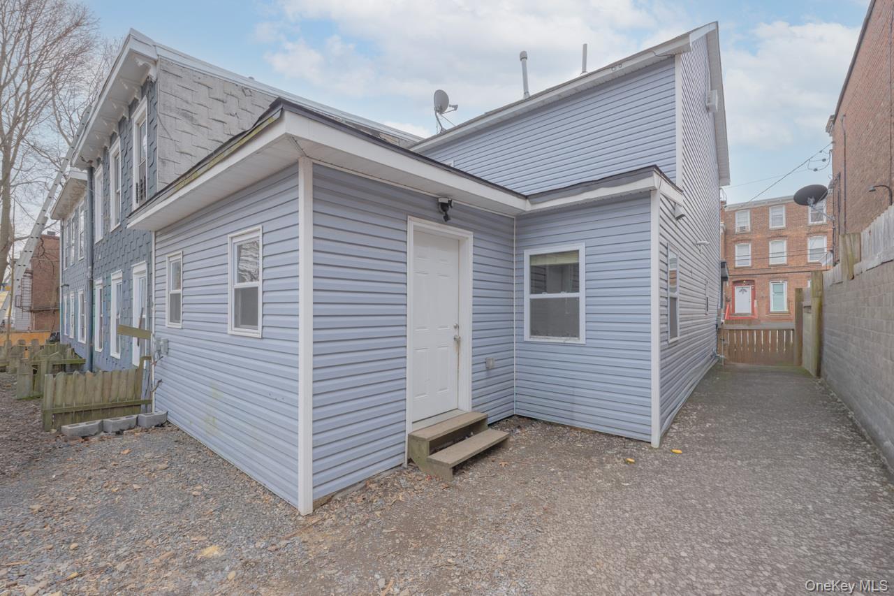 280 1st Street Newburgh, NY 12550 - Photo 22 of 24 a view of a house with a yard