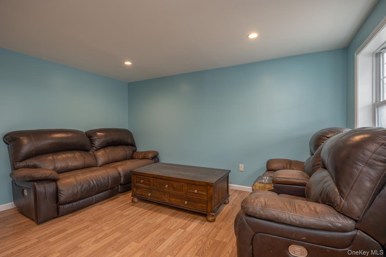 280 1st Street Newburgh, NY 12550 - Photo 8 of 24 a living room with furniture and a couch