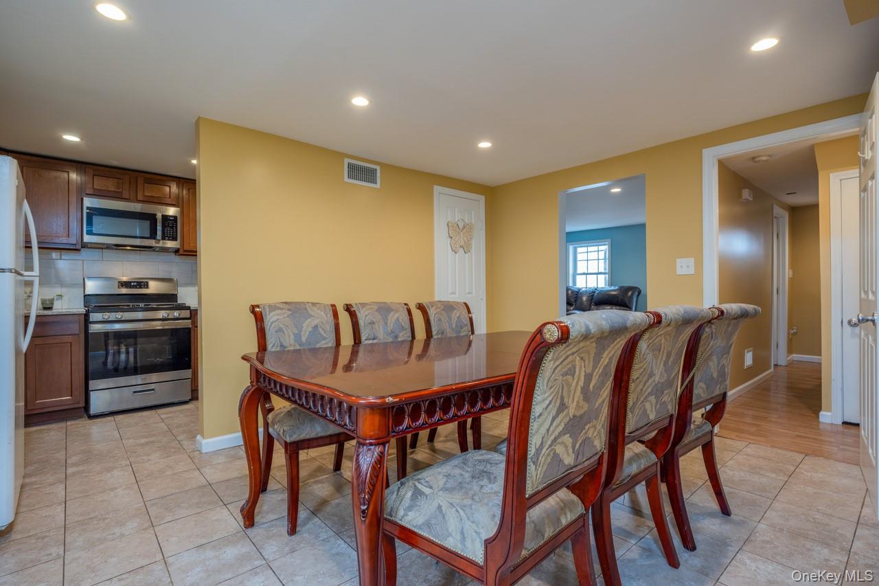 280 1st Street Newburgh, NY 12550 - Photo 9 of 24 a view of a dining room with furniture