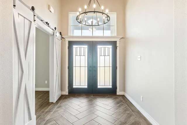 a view of entryway with wooden floor