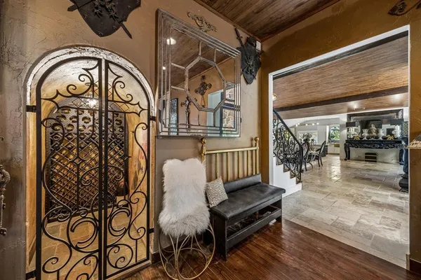 a view of a dining room that has a table and chairs