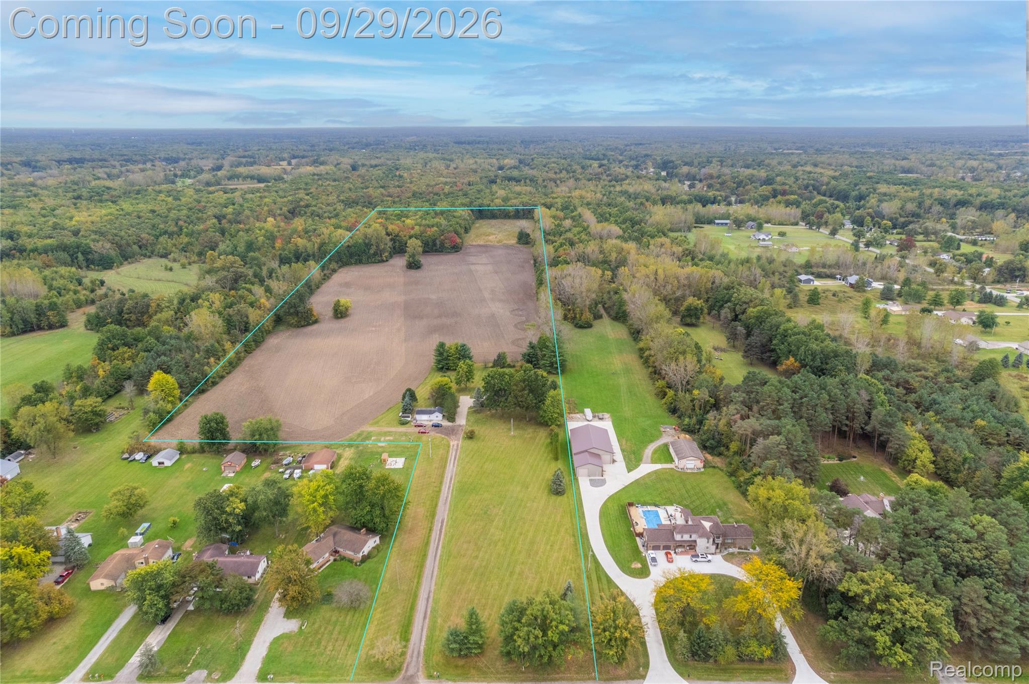 6411 Farrand Road Clio, MI 48420 - Photo 3 of 33 Expansive land parcel featuring open fields and mature tree lines
