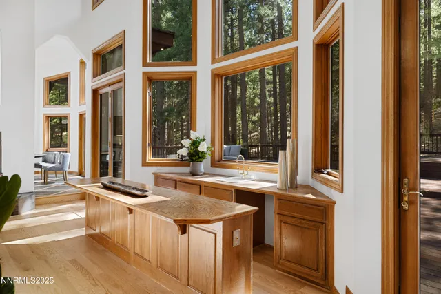 a kitchen with stainless steel appliances a sink stove and refrigerator