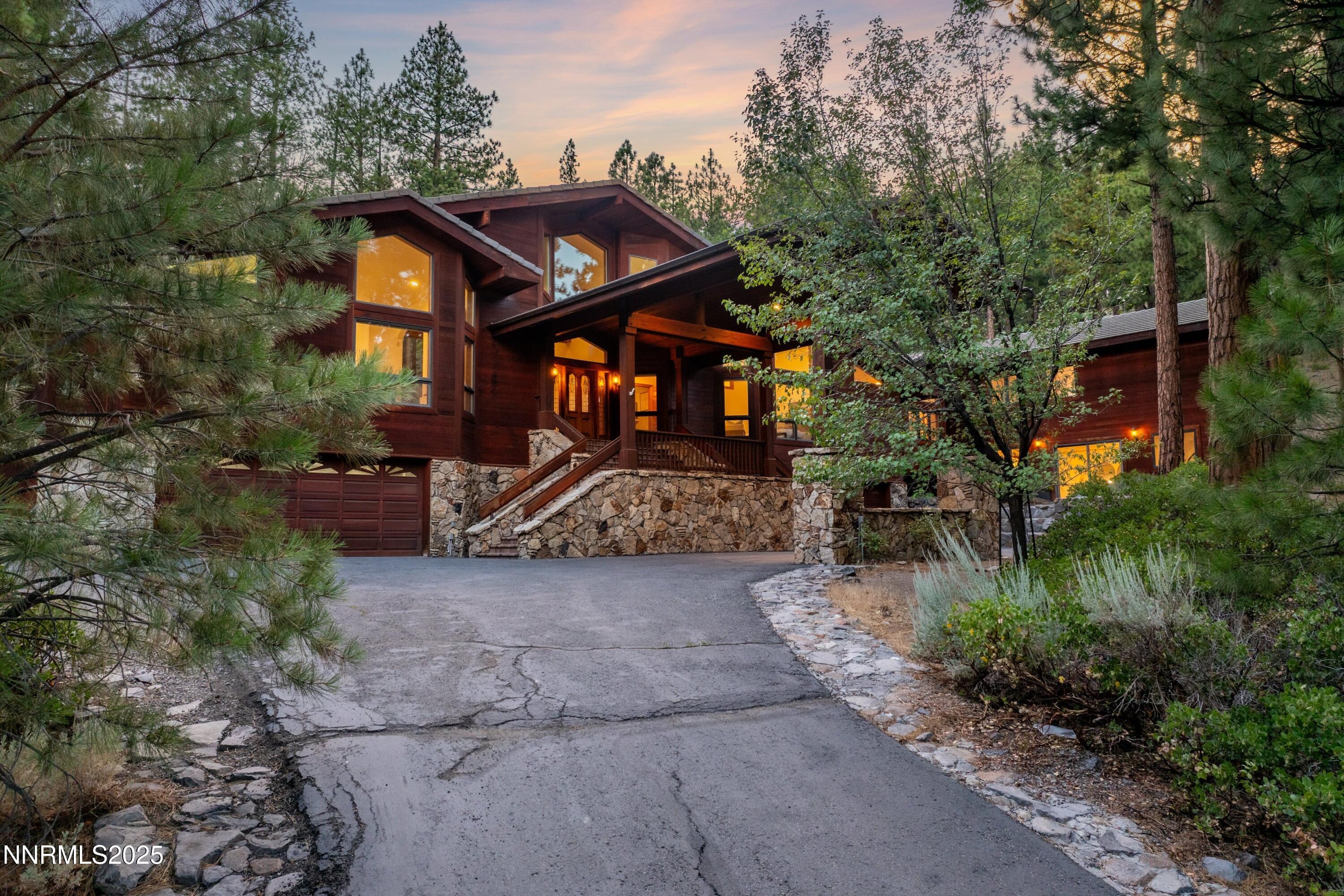 1745 Green Ash Drive Reno, NV 89511 - Photo 2 of 64 a front view of a house with garden