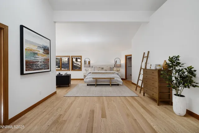 a bathroom with a granite countertop tub sink and mirror