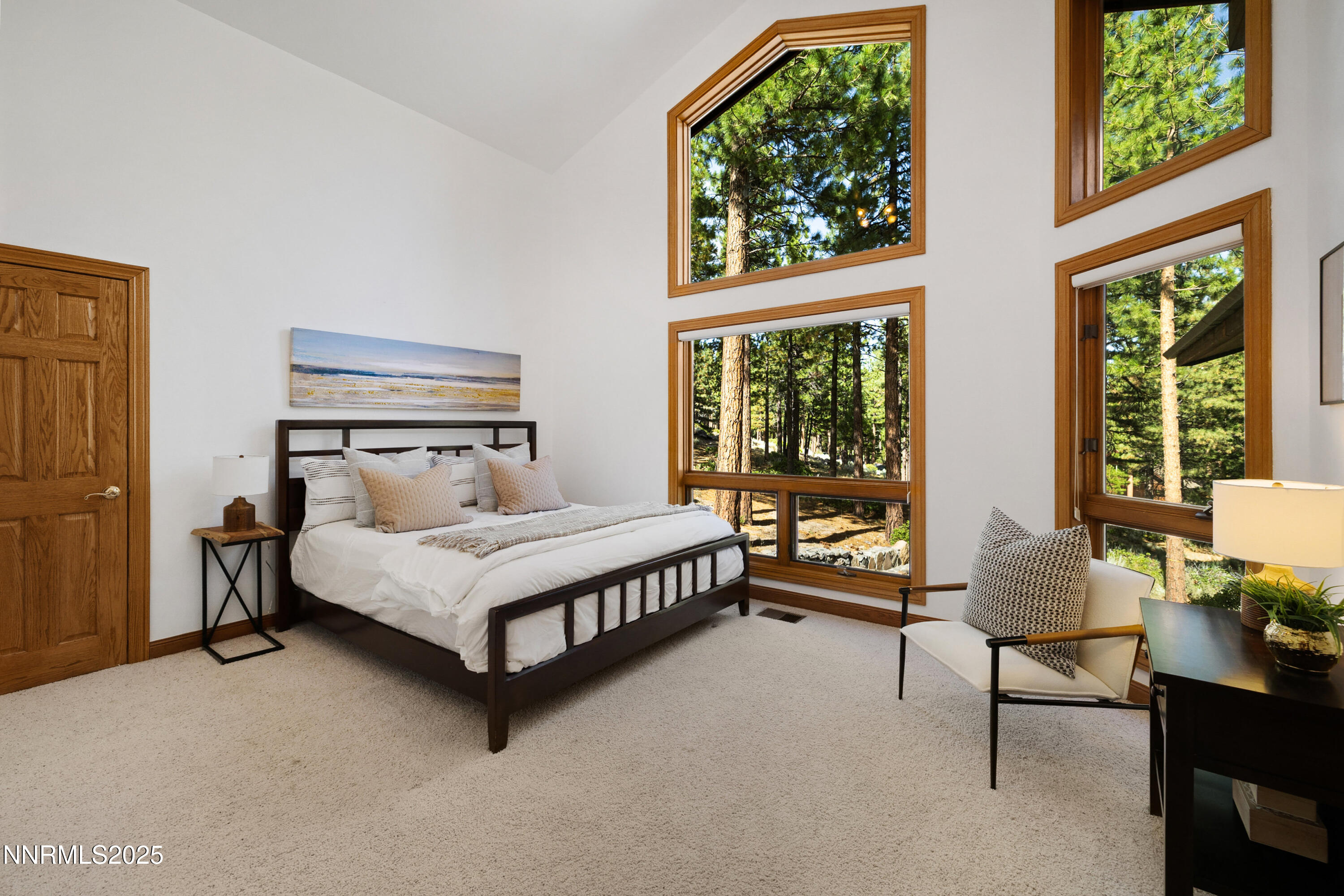 1745 Green Ash Drive Reno, NV 89511 - Photo 30 of 64 a bed sitting in a spacious bedroom next to a window