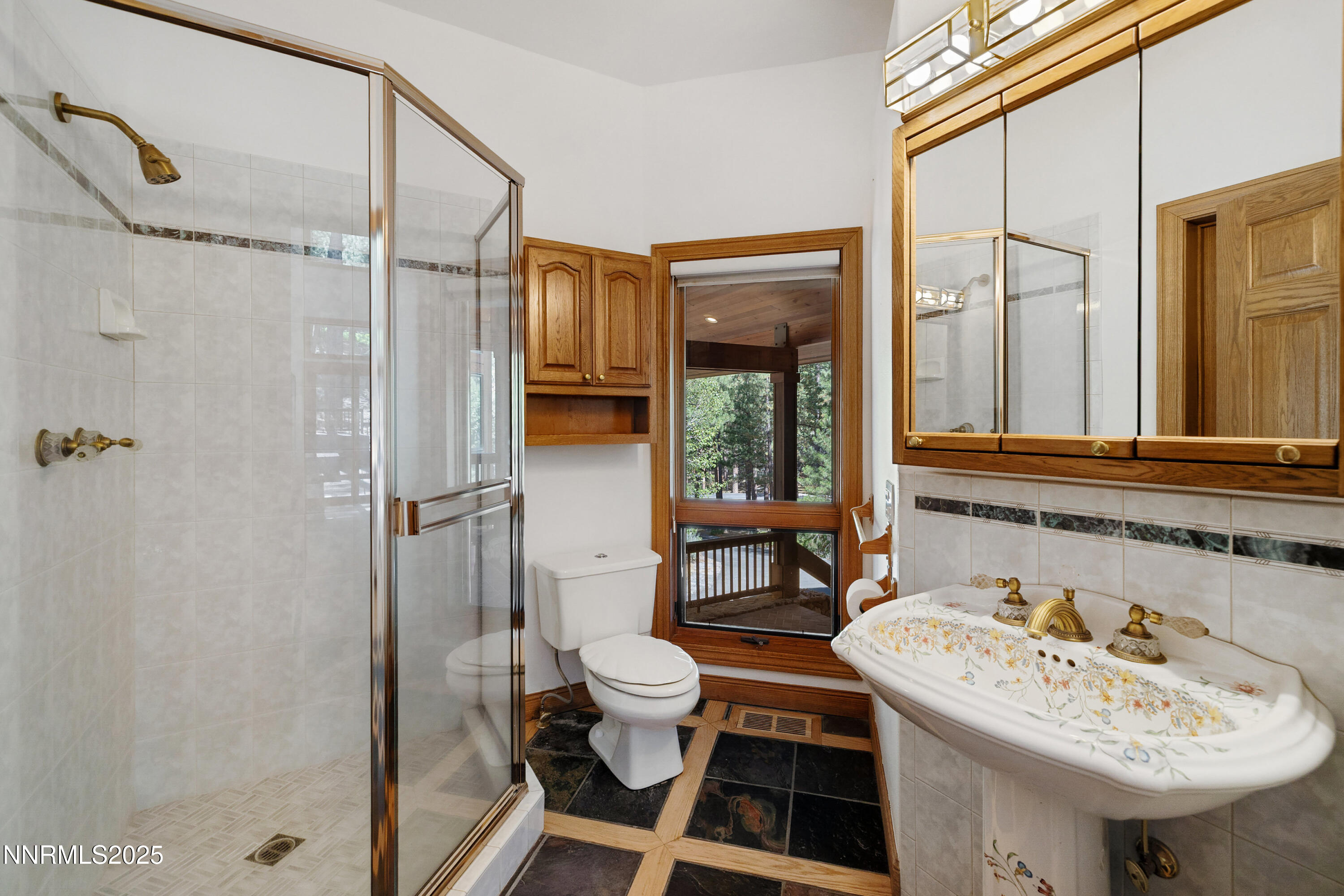 1745 Green Ash Drive Reno, NV 89511 - Photo 31 of 64 a bathroom with a sink toilet and shower