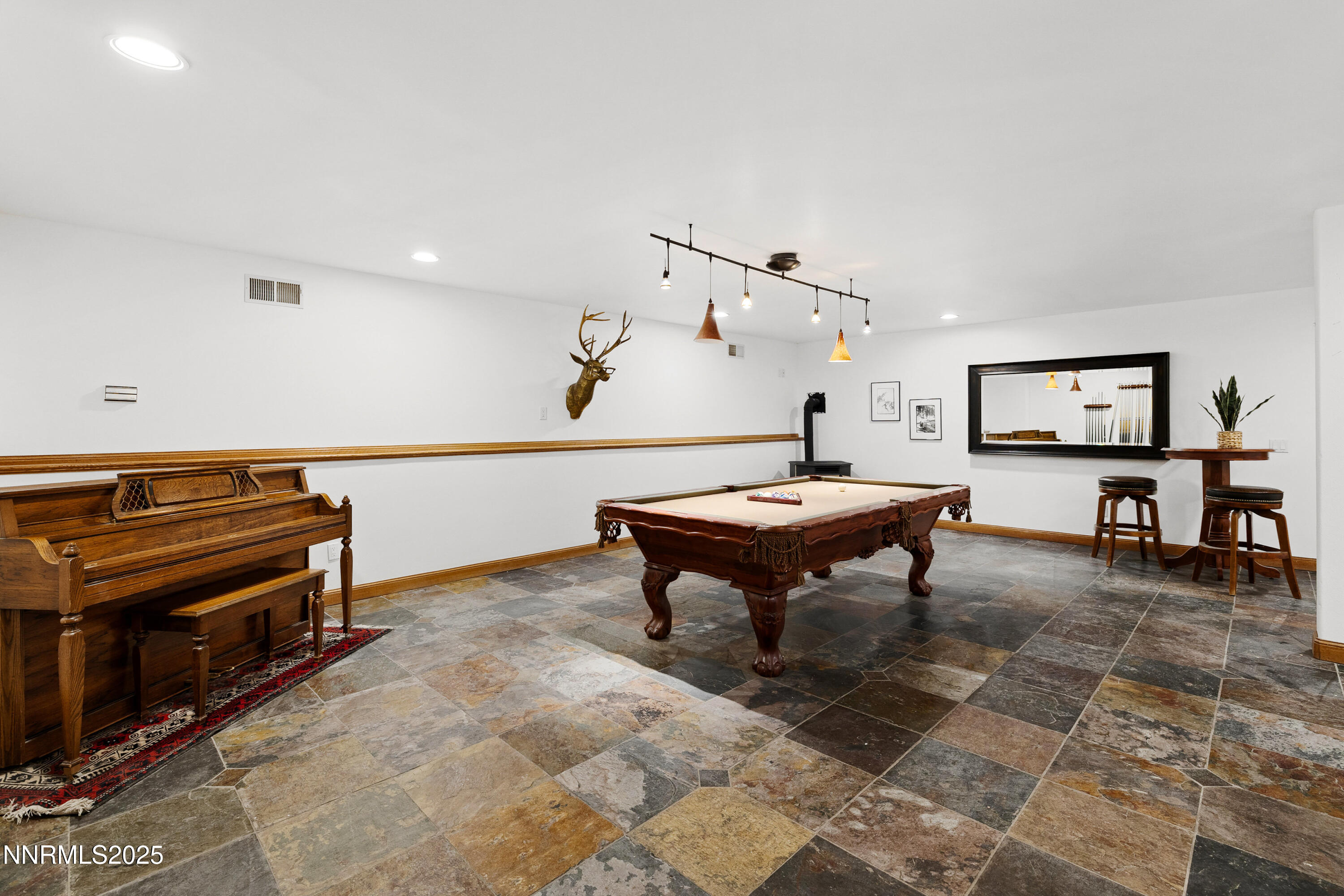 1745 Green Ash Drive Reno, NV 89511 - Photo 37 of 64 a living room with furniture and a piano