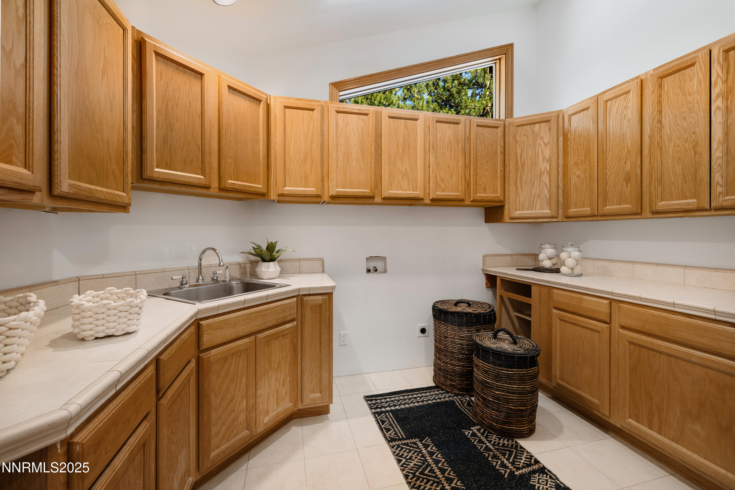 1745 Green Ash Drive Reno, NV 89511 - Photo 41 of 64 a kitchen with a sink stove and cabinets