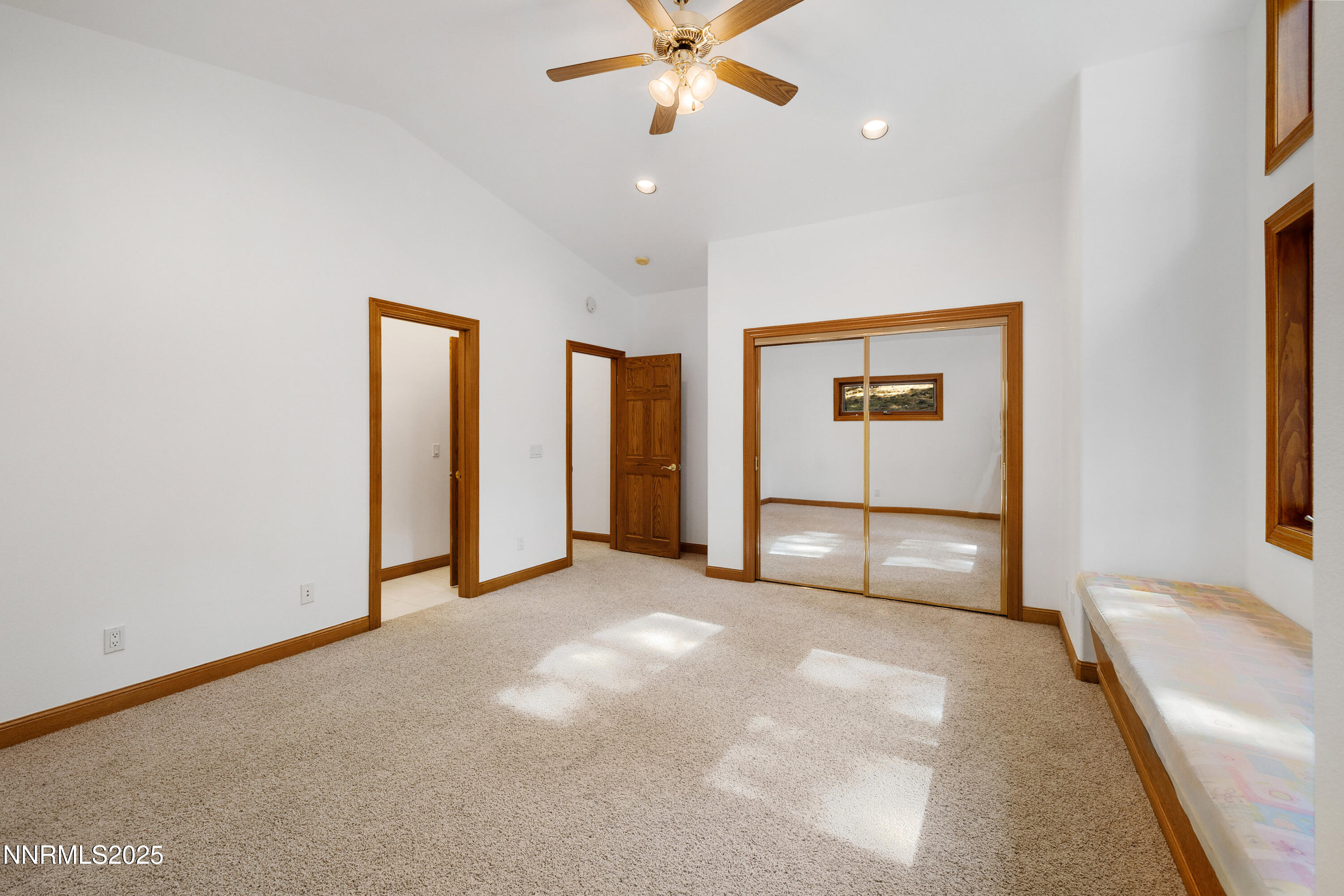 1745 Green Ash Drive Reno, NV 89511 - Photo 49 of 64 a view of a livingroom with a ceiling fan and window