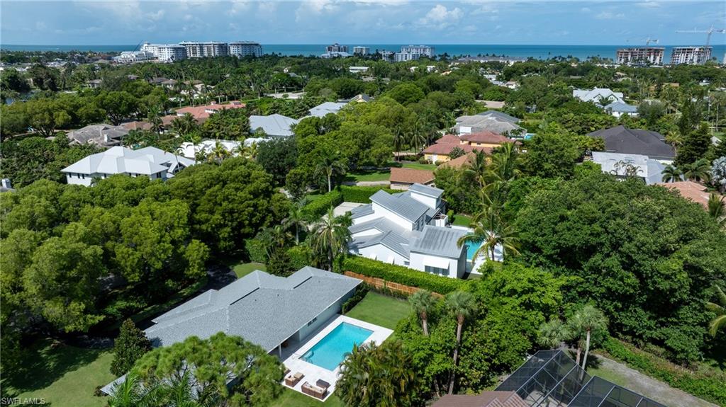 675 Yucca Road Naples, FL 34102 - Photo 2 of 24 an aerial view of multiple house