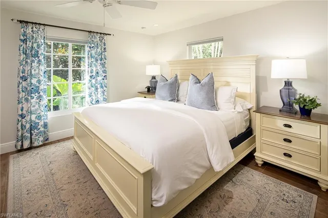 a bed room with a bed and a window