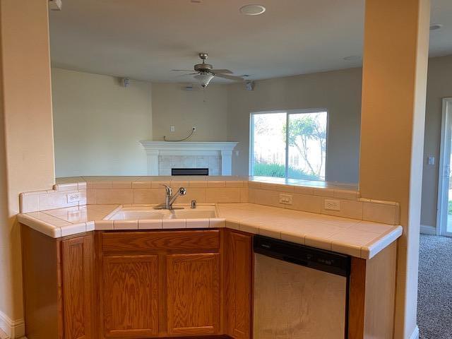 495 Springtime Lane Red Bluff, CA 96080 - Photo 8 of 20 a kitchen with a sink and a window