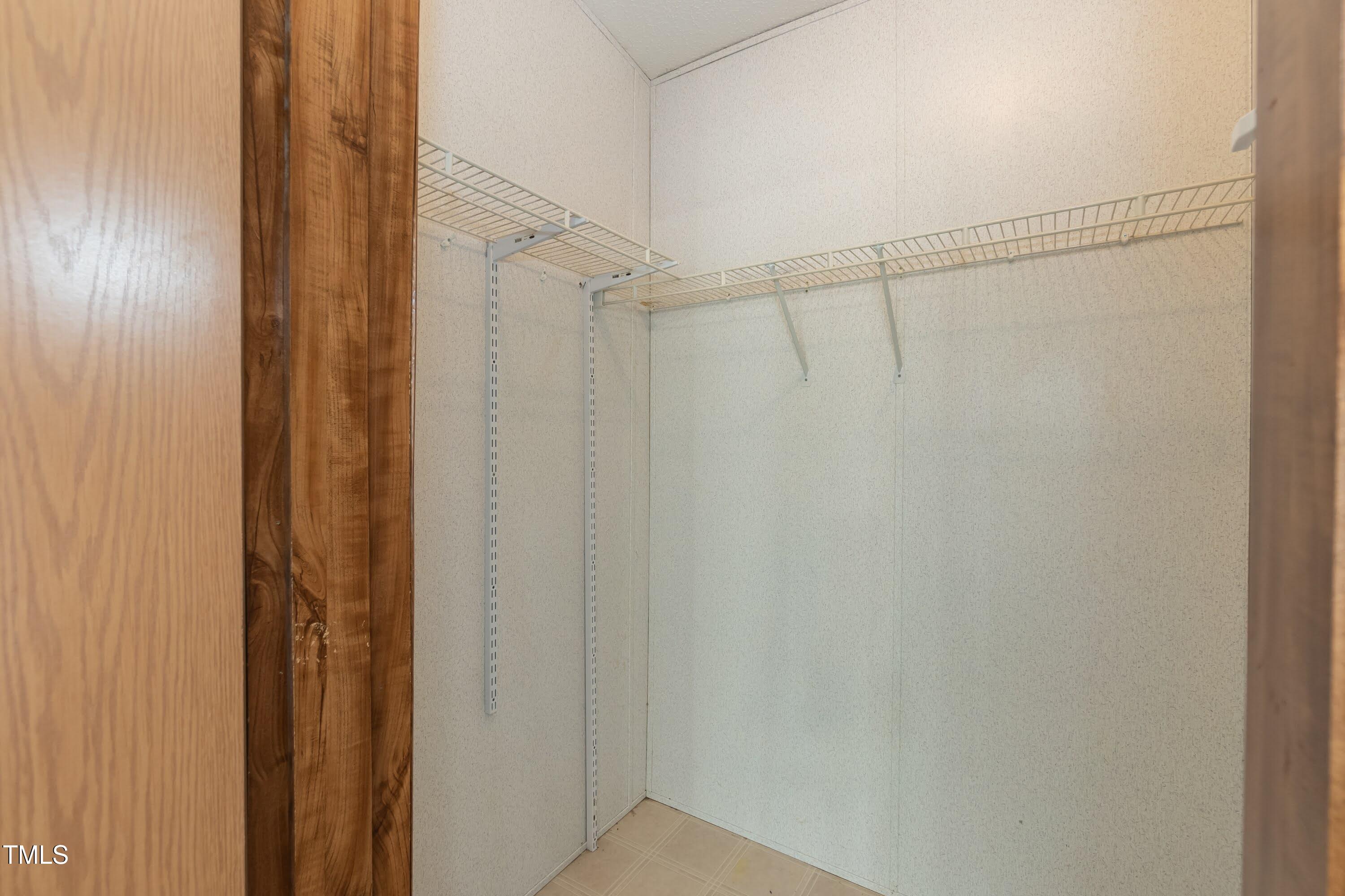 7589 Sam Hall Road Oxford, NC 27565 - Photo 37 of 40 Primary Closet 01