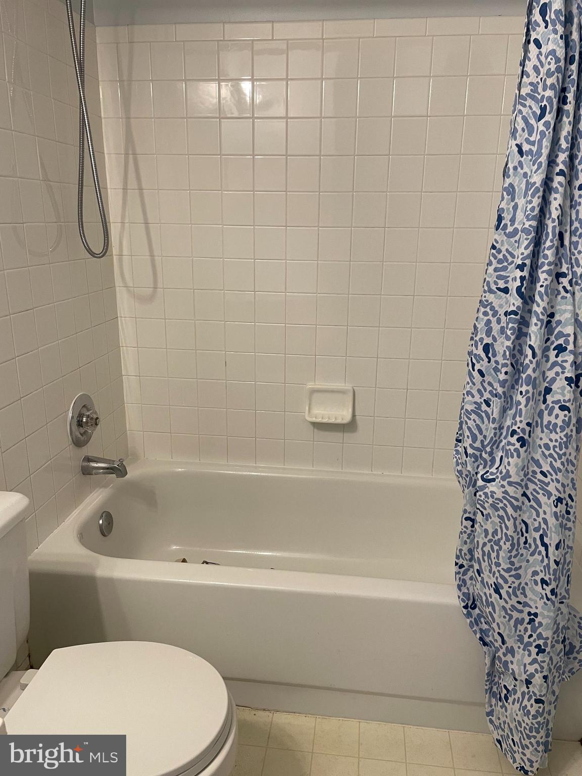 6223 Cliffside Terrace Frederick, MD 21701 - Photo 13 of 18 a bathroom with a bathtub and shower