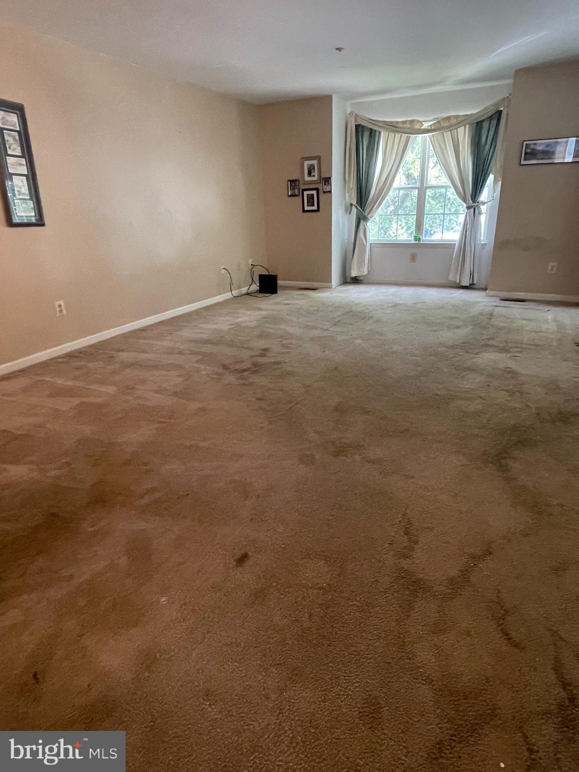 6223 Cliffside Terrace Frederick, MD 21701 - Photo 7 of 18 a view of an empty room with a fireplace