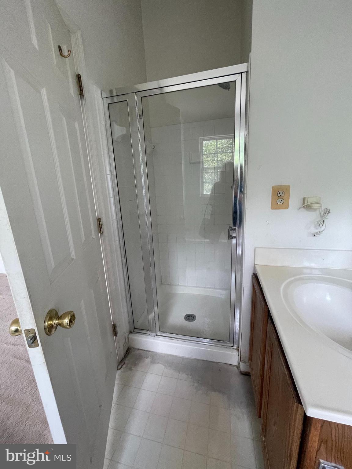 6223 Cliffside Terrace Frederick, MD 21701 - Photo 9 of 18 a bathroom with a tub sink and shower