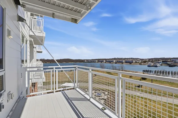 a living room with furniture kitchen view and a dining table