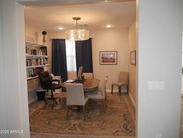 a view of a dining room with furniture