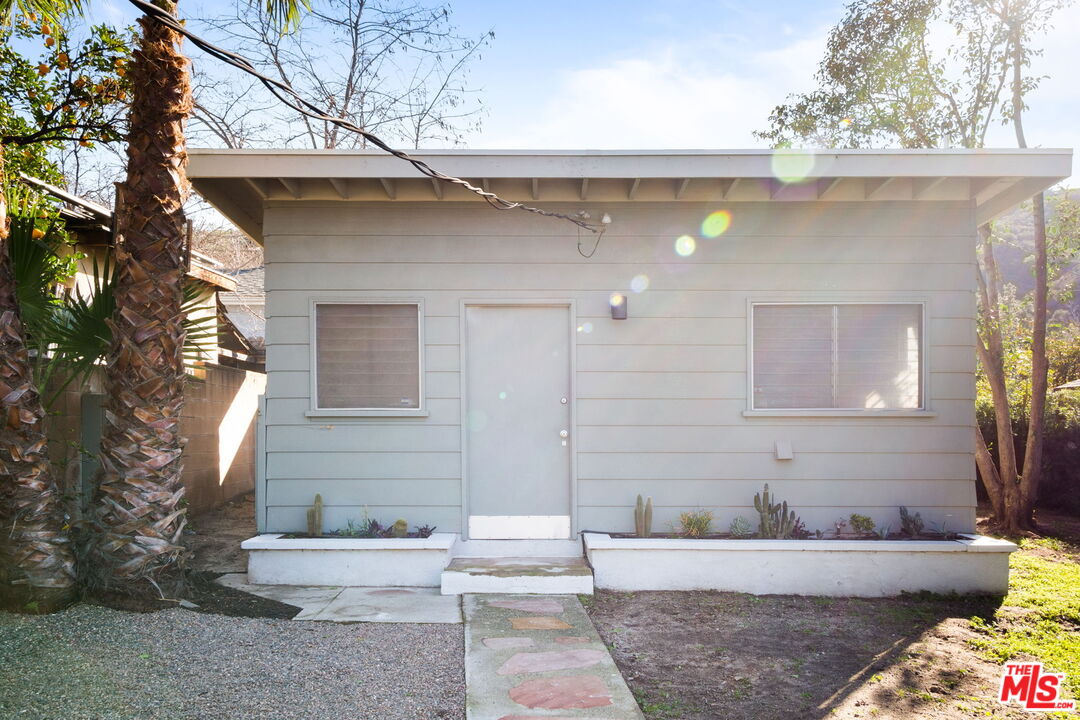7606 Valmont Street Tujunga, CA 91042 - Photo 22 of 24 a front view of a house with outdoor space