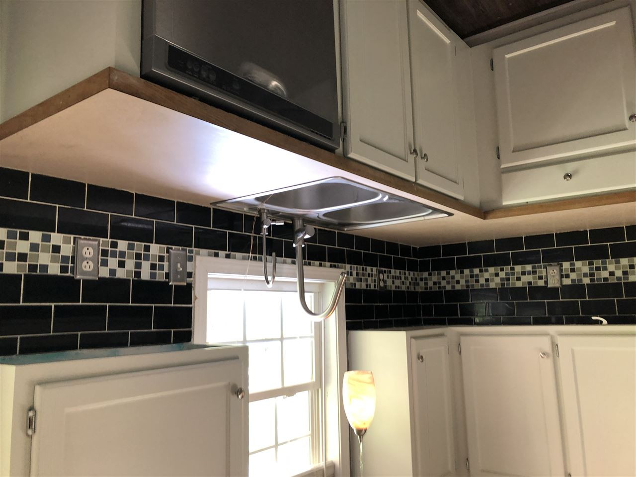2518 Siler Road Snow Camp, NC 27349 - Photo 6 of 24 Dishwasher and pendant lighting compliment tile back splash. Kitchen