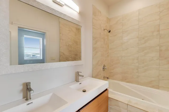 a bathroom with a sink and a bathtub