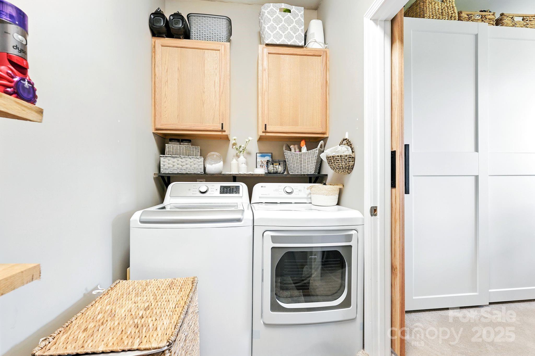 131 Sheffield Road Mocksville, NC 27028 - Photo 11 of 21 a utility room with dryer and washer