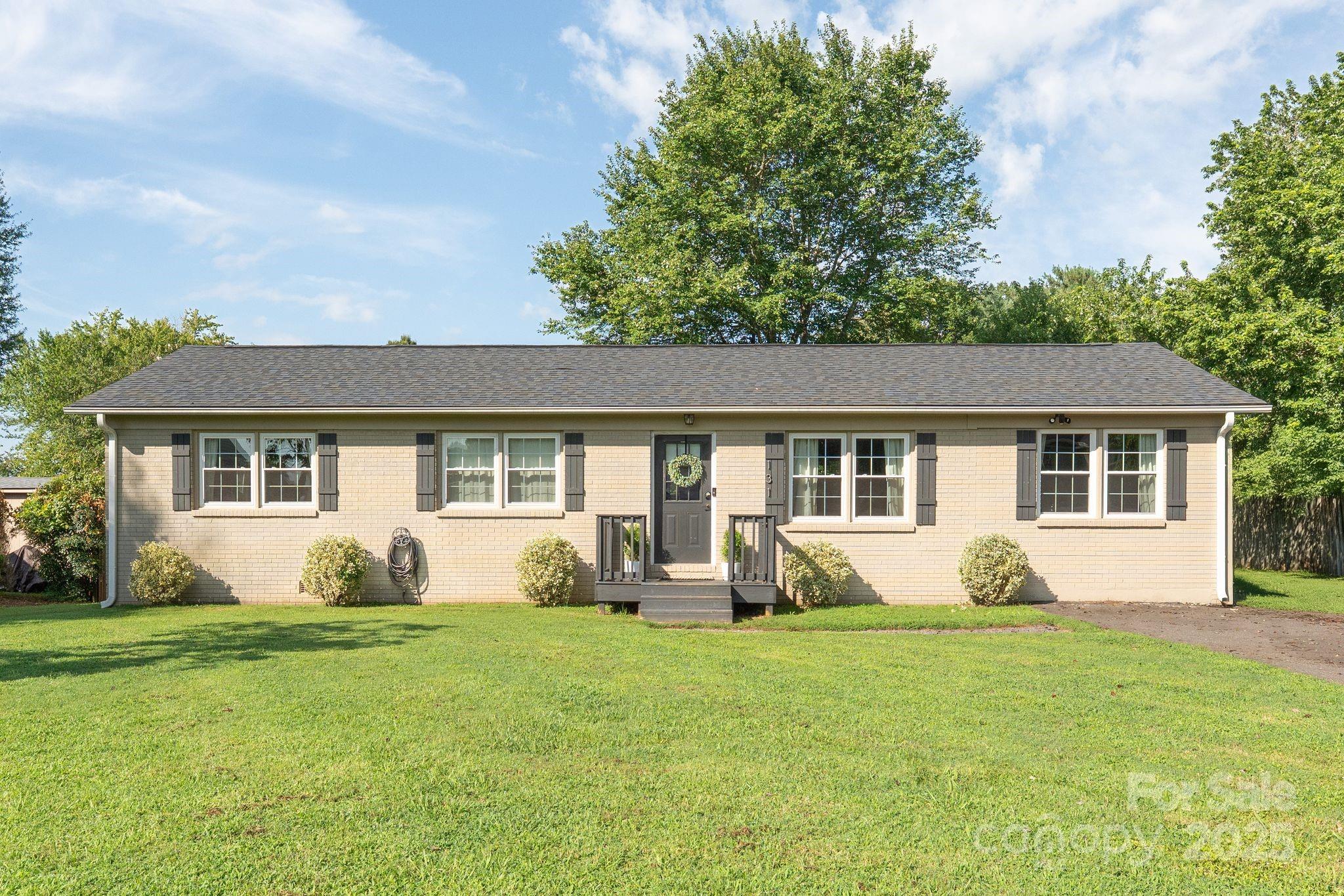 131 Sheffield Road Mocksville, NC 27028 - Photo 2 of 21 a front view of house with yard with green space