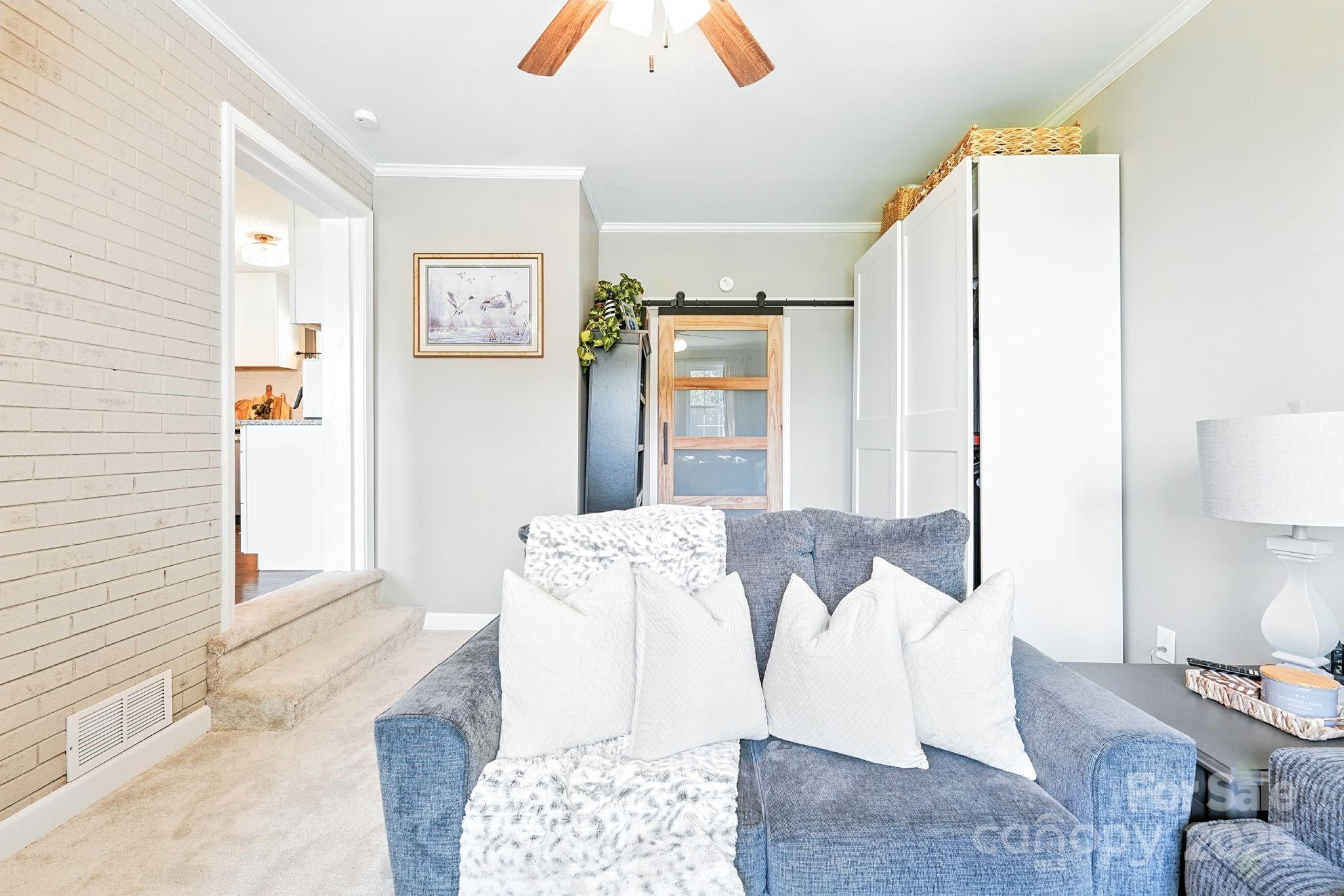 131 Sheffield Road Mocksville, NC 27028 - Photo 9 of 21 a living room with furniture and a couch