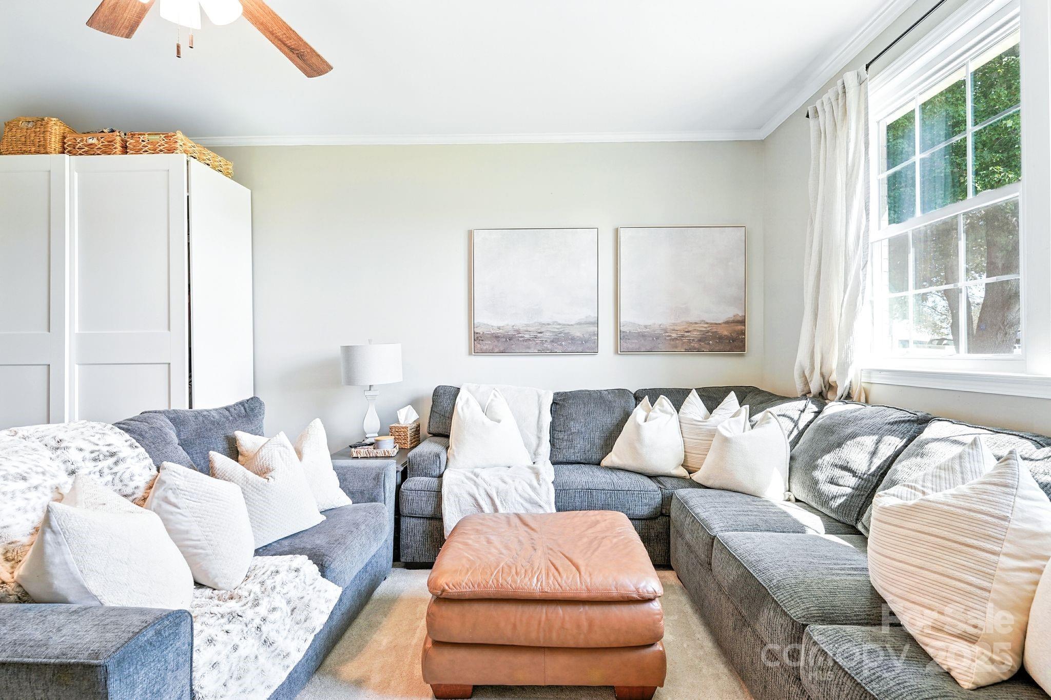 131 Sheffield Road Mocksville, NC 27028 - Photo 10 of 21 a living room with furniture and a large window