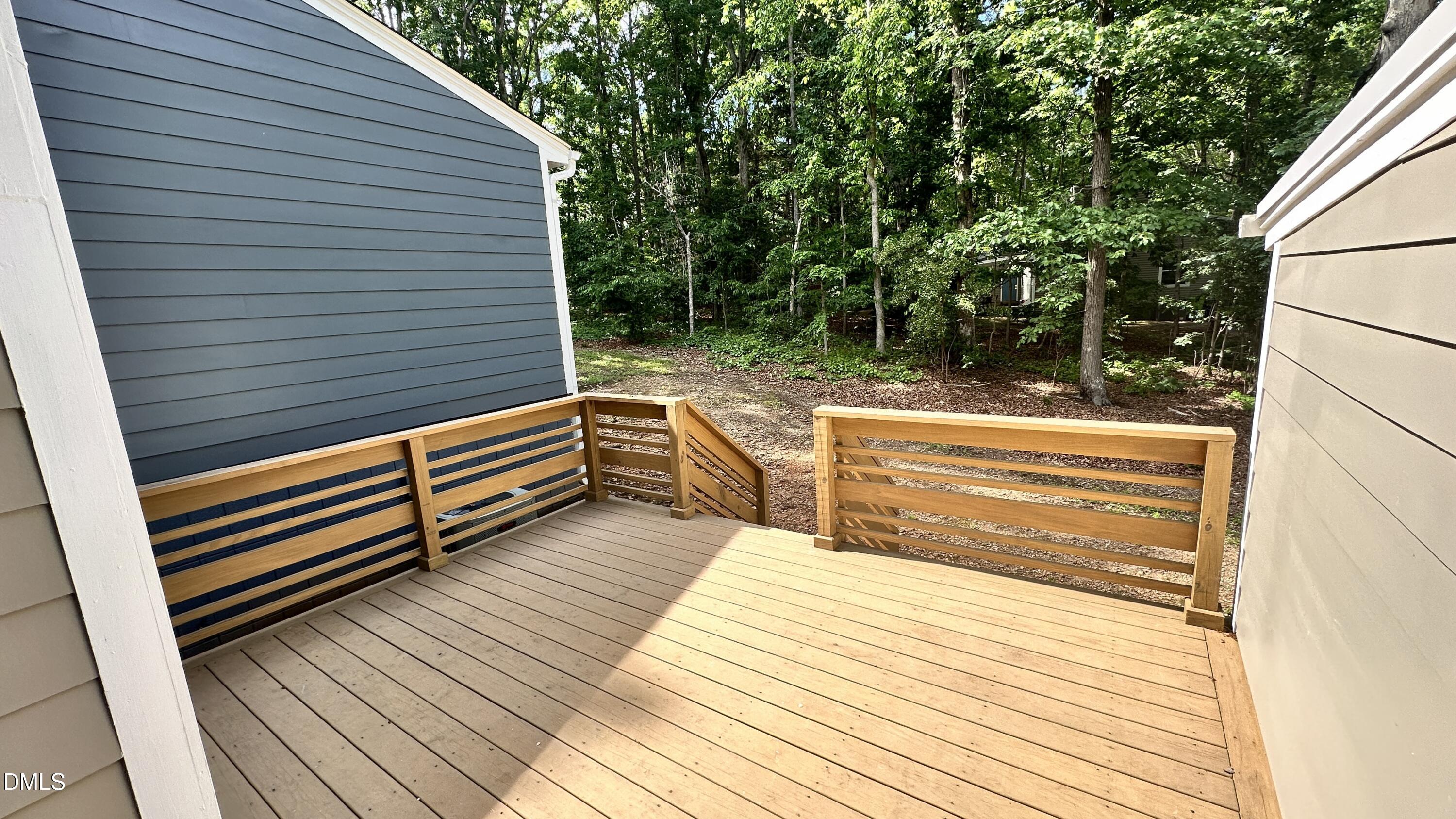 4705 Fargo Court, Unit B Raleigh, NC 27612 - Photo 9 of 9 a view of a wooden deck
