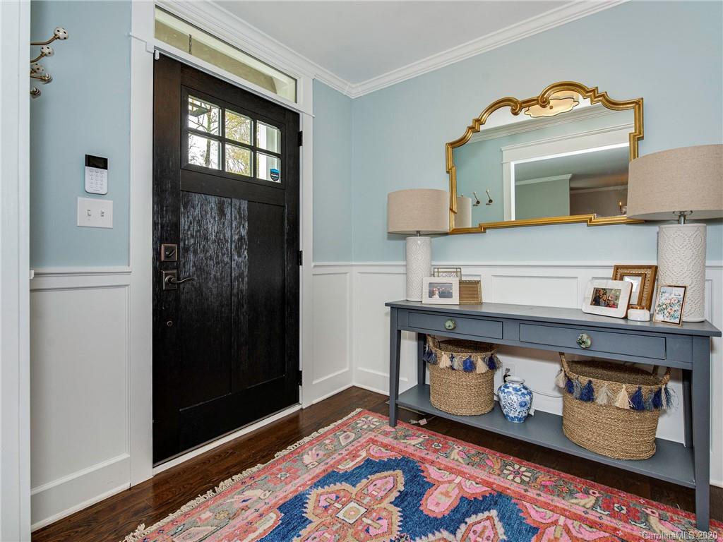 722 Trail Ridge Road Matthews, NC 28105 - Photo 3 of 32 a room with a fireplace and cabinets