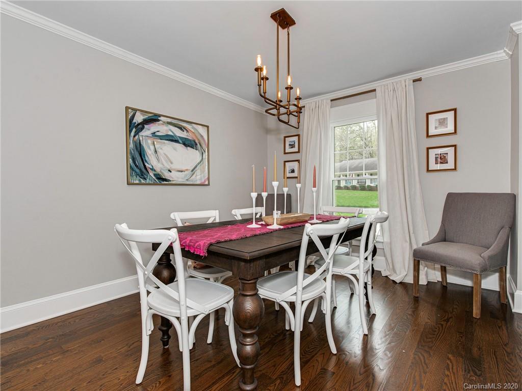 722 Trail Ridge Road Matthews, NC 28105 - Photo 8 of 32 a dining room with furniture window and wooden floor