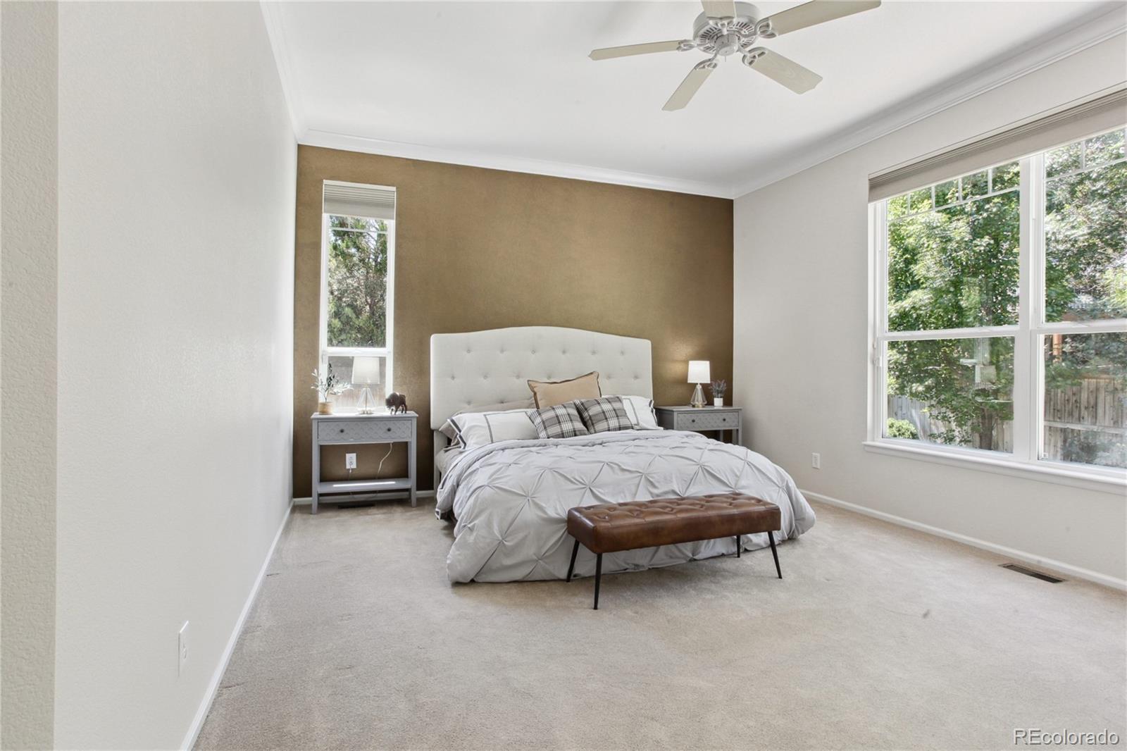 3626 Pointer Way Highlands Ranch, CO 80126 - Photo 11 of 33 a bedroom with a bed and window