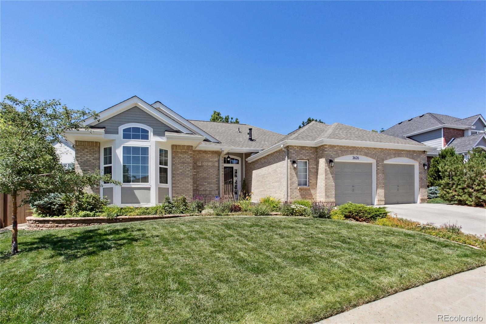 3626 Pointer Way Highlands Ranch, CO 80126 - Photo 26 of 33 a front view of a house with a yard
