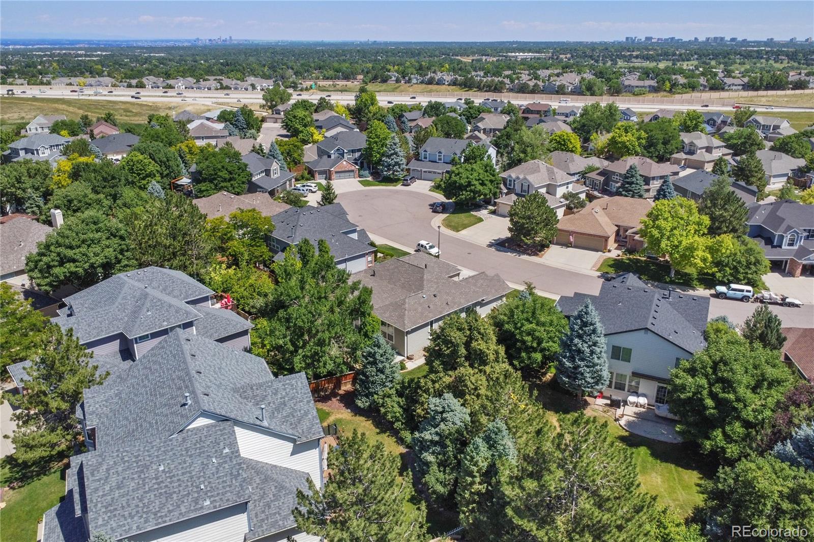 3626 Pointer Way Highlands Ranch, CO 80126 - Photo 30 of 33 an aerial view of a city with lake view