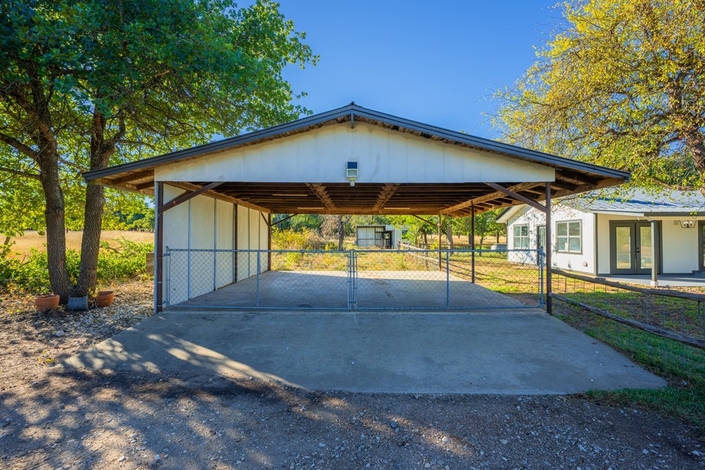 28 Ruger Road Fredericksburg, TX 78624 - Photo 16 of 43 a view of an house with backyard and balcony