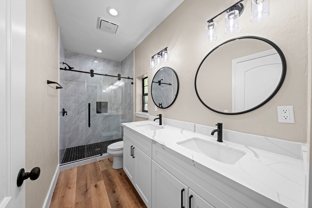 28 Ruger Road Fredericksburg, TX 78624 - Photo 23 of 43 a bathroom with a sink and a mirror