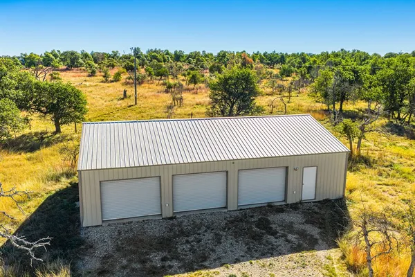 a view of an empty room with a garage