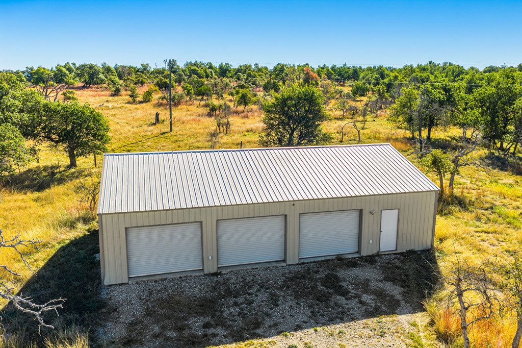 28 Ruger Road Fredericksburg, TX 78624 - Photo 36 of 43 a view of a house with a yard next to a yard